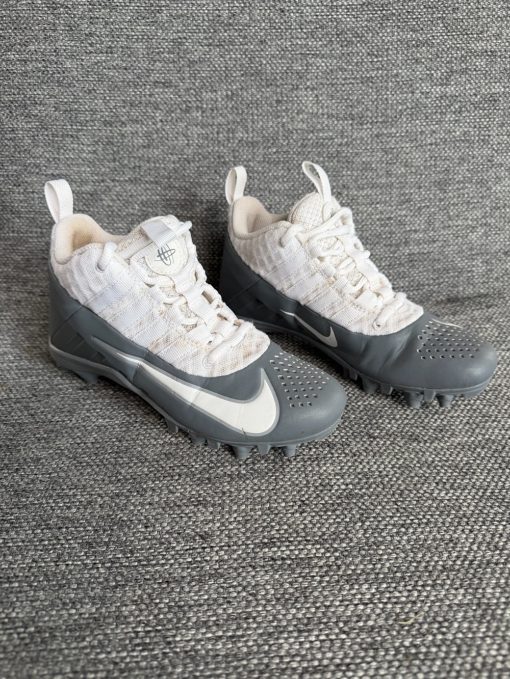 Nike White and Gray Lacrosse Cleats with Swoosh Accent